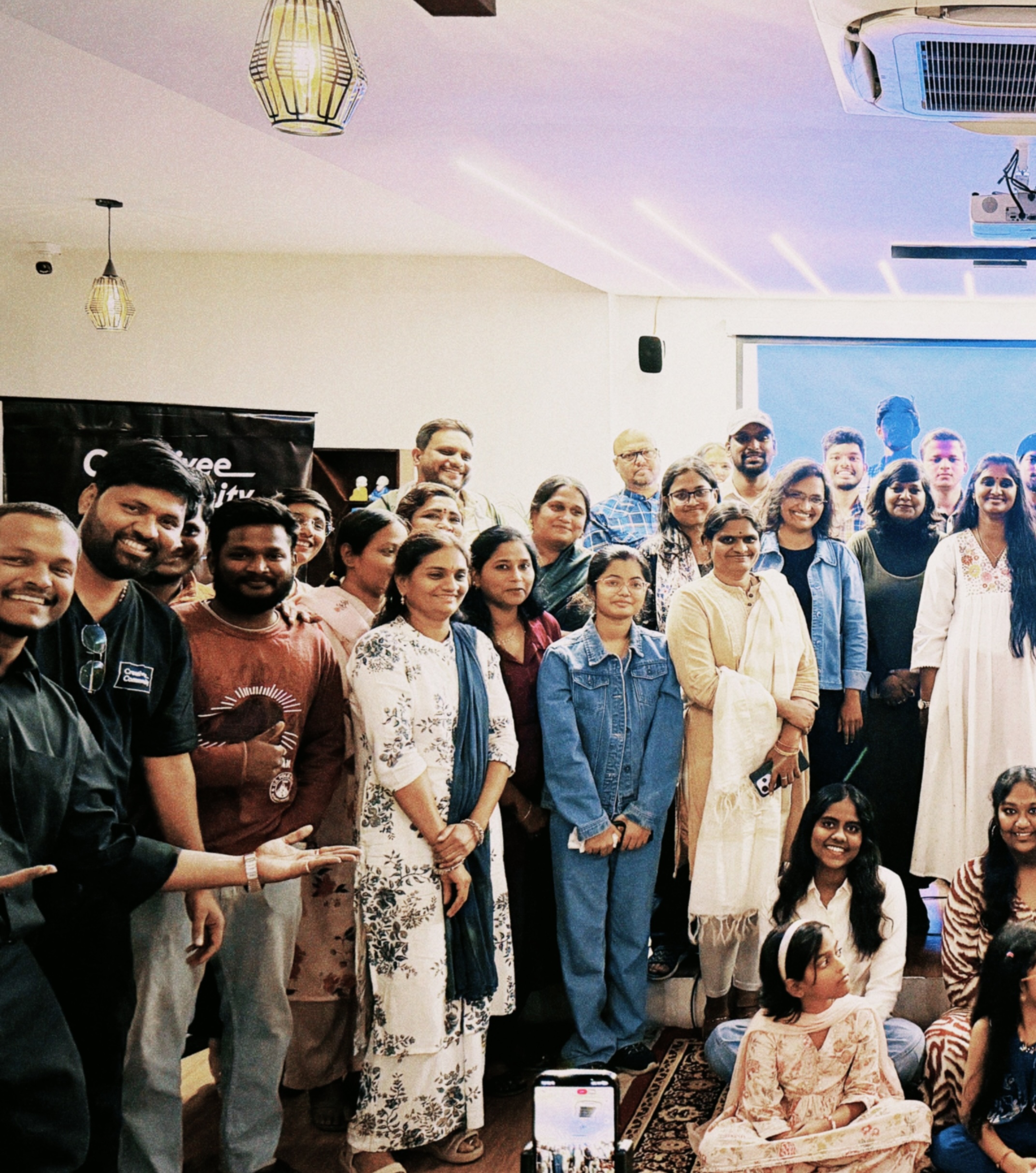 Tejj with the Creativee design community he founded — global mentorship gathering