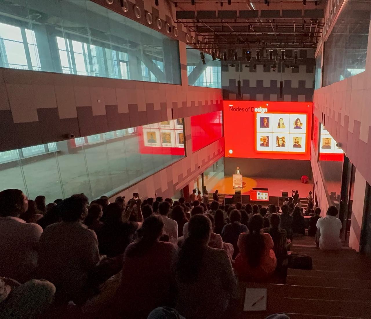 Tejj presenting to a live audience